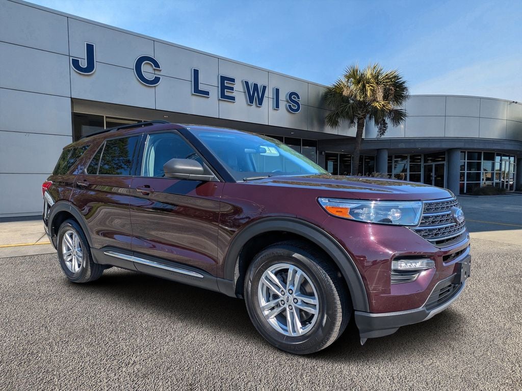 2023 Ford Explorer XLT in Jewel Red Metallic Tinted Clearcoat — front three-quarter view