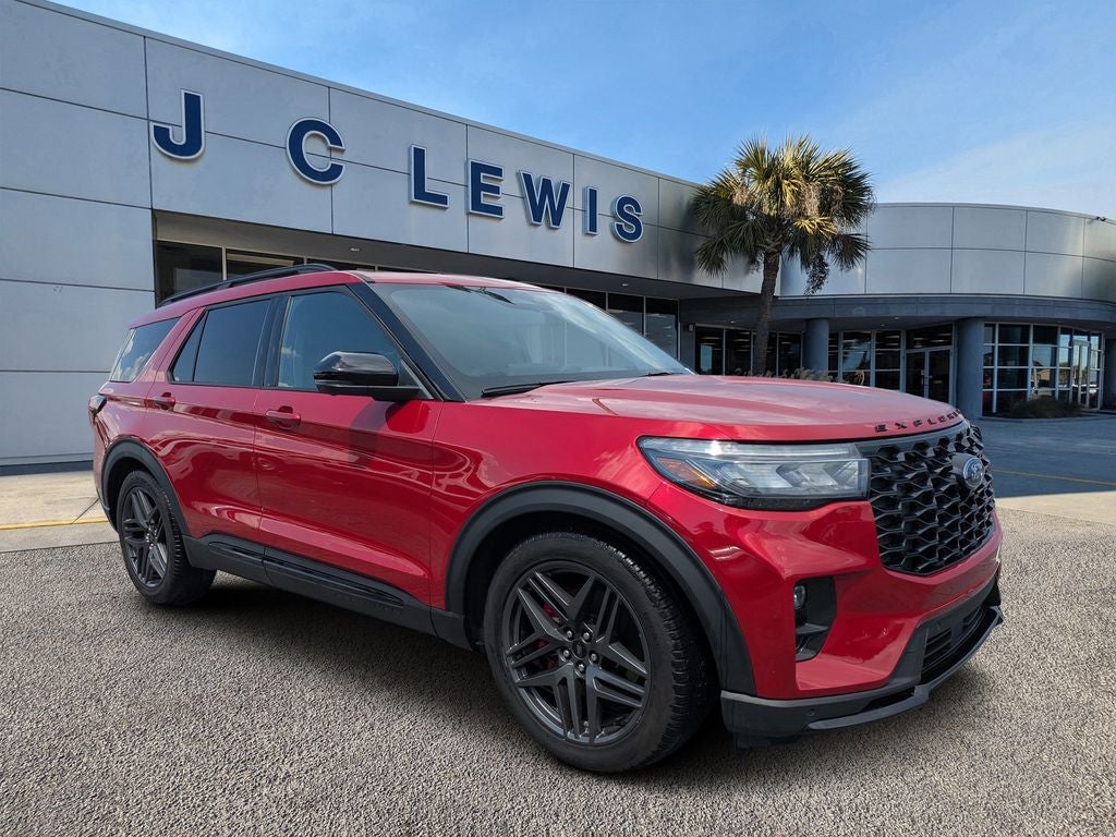 2025 Ford Explorer ST in Rapid Red Metallic Tinted Clearcoat — front three-quarter view