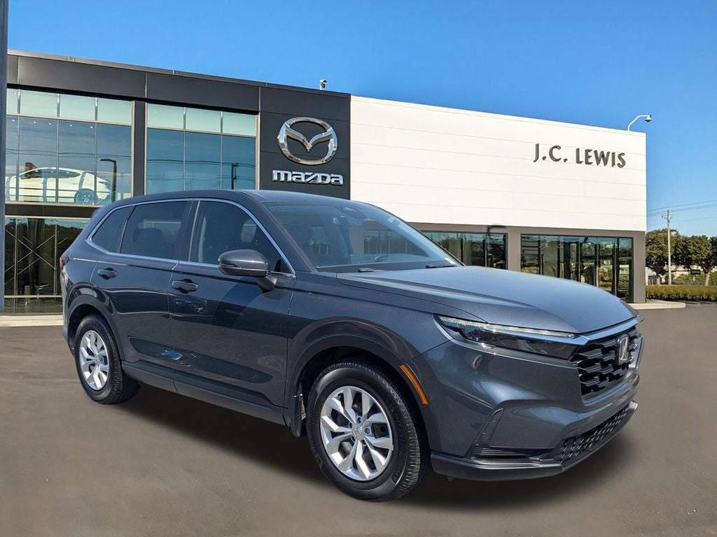 2024 Honda CR-V LX in Meteorite Gray Metallic — front three-quarter view